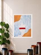 A Poster Print featuring a mixed media art piece displayed hanging on a wall in a room with a plant, paint cans, and window shadows in the display. The art image has a blue and white limewash background with gold textured way like accents on the upper left corner and the lower right corner of the piece. It also features a white head to lower shoulder silhouette of a person made up of a depicted texture like pattern that has a red paint brush streak that lays over the eyes to ears.